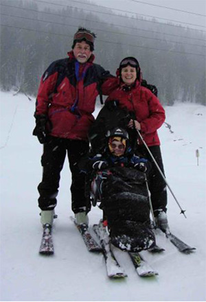 The Wallhead family skiing togther